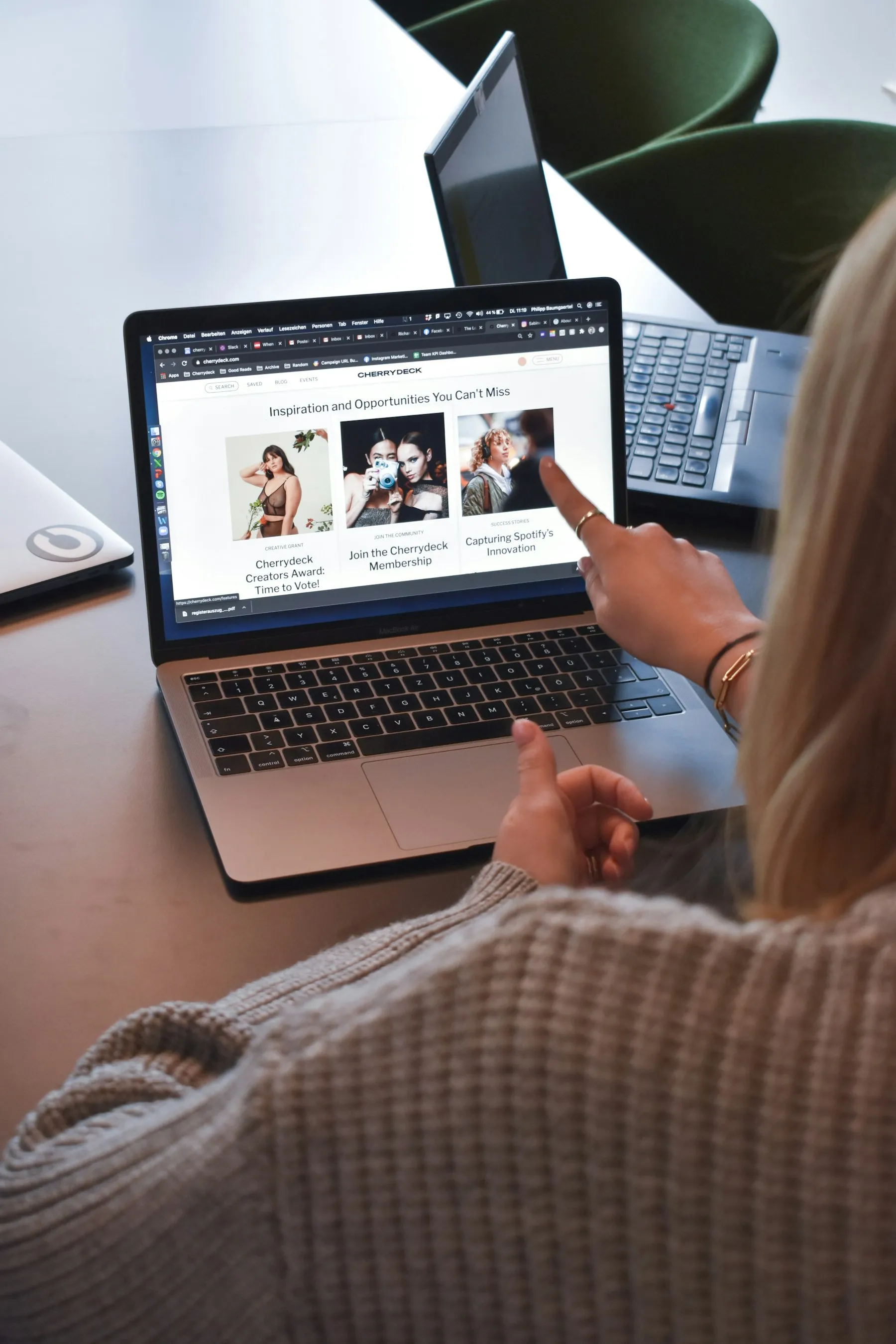 A person reviewing a website design on a laptop